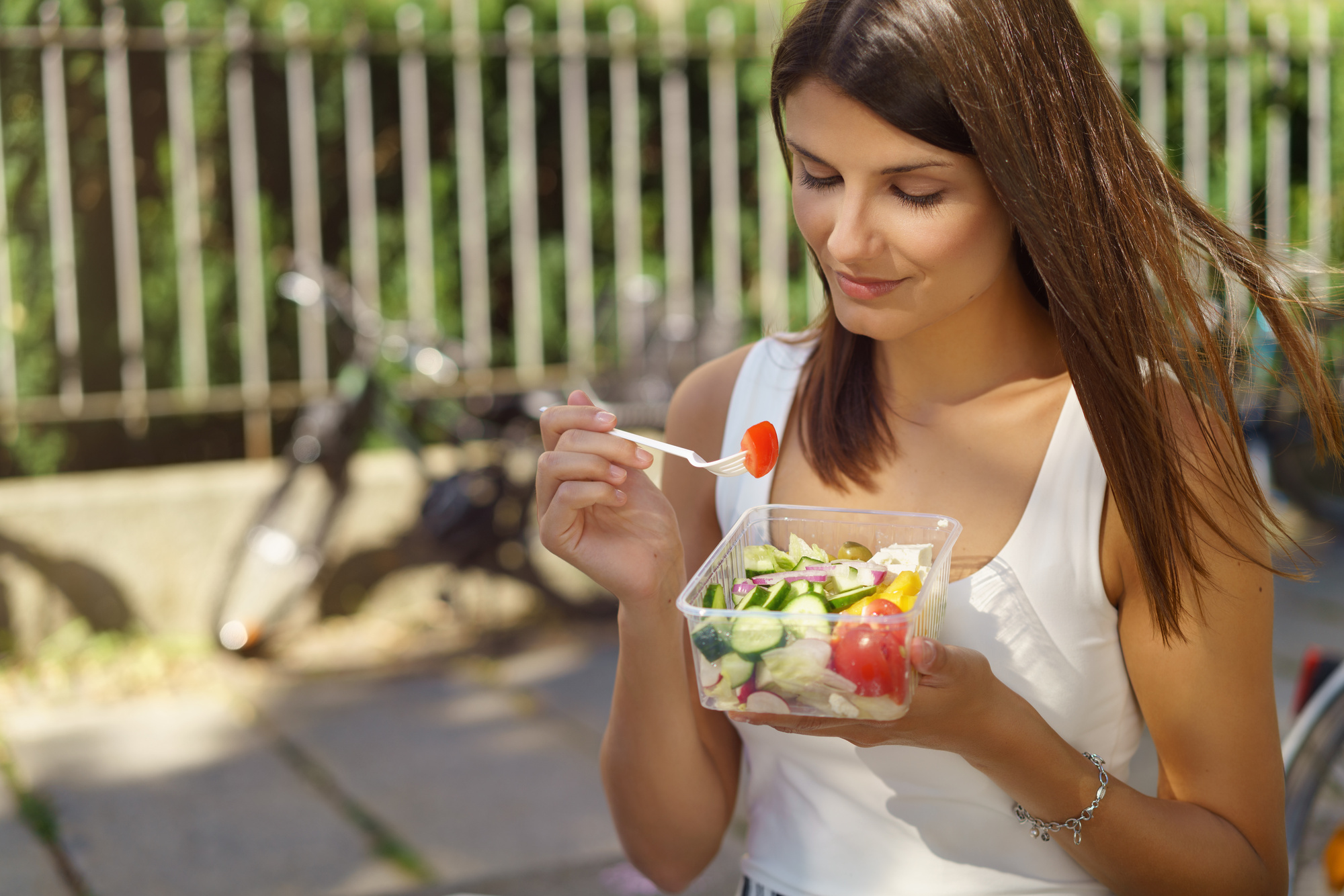 woman eating a salad